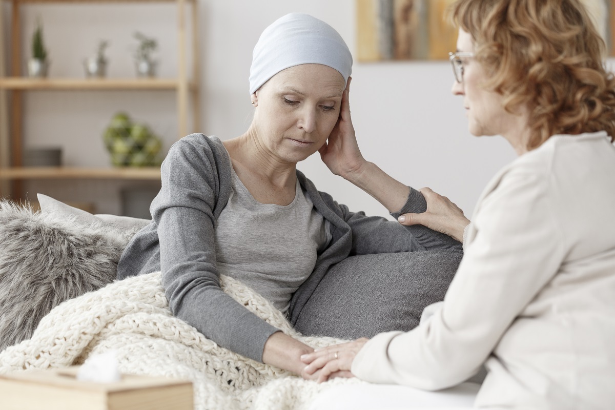 Woman talking to another woman with ovarian cancer