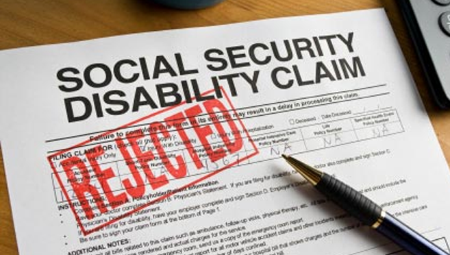 Social Security Disability form with rejection stamp on it