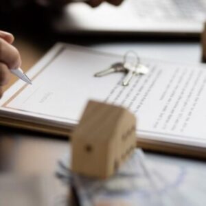 Someone signing an estate planning document who may have already considered what the pros and cons of a Lady Bird deed are