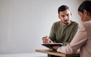 A man with an arm injury asks his lawyer what evidence is needed for a disability appeal.