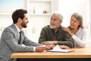 An older couple consults with a lawyer and asks what estate planning is.