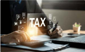 Someone working on their taxes at a computer who may be wondering about disability insurance taxation and whether their Long Term Disability benefits are taxable